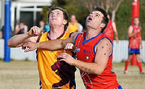 Redbacks player Jason Hoole leaps for the ball in the clash against Highfields on Saturday. Redbacks player Jason Hoole leaps for the ball in the clash against Highfields on Saturday.